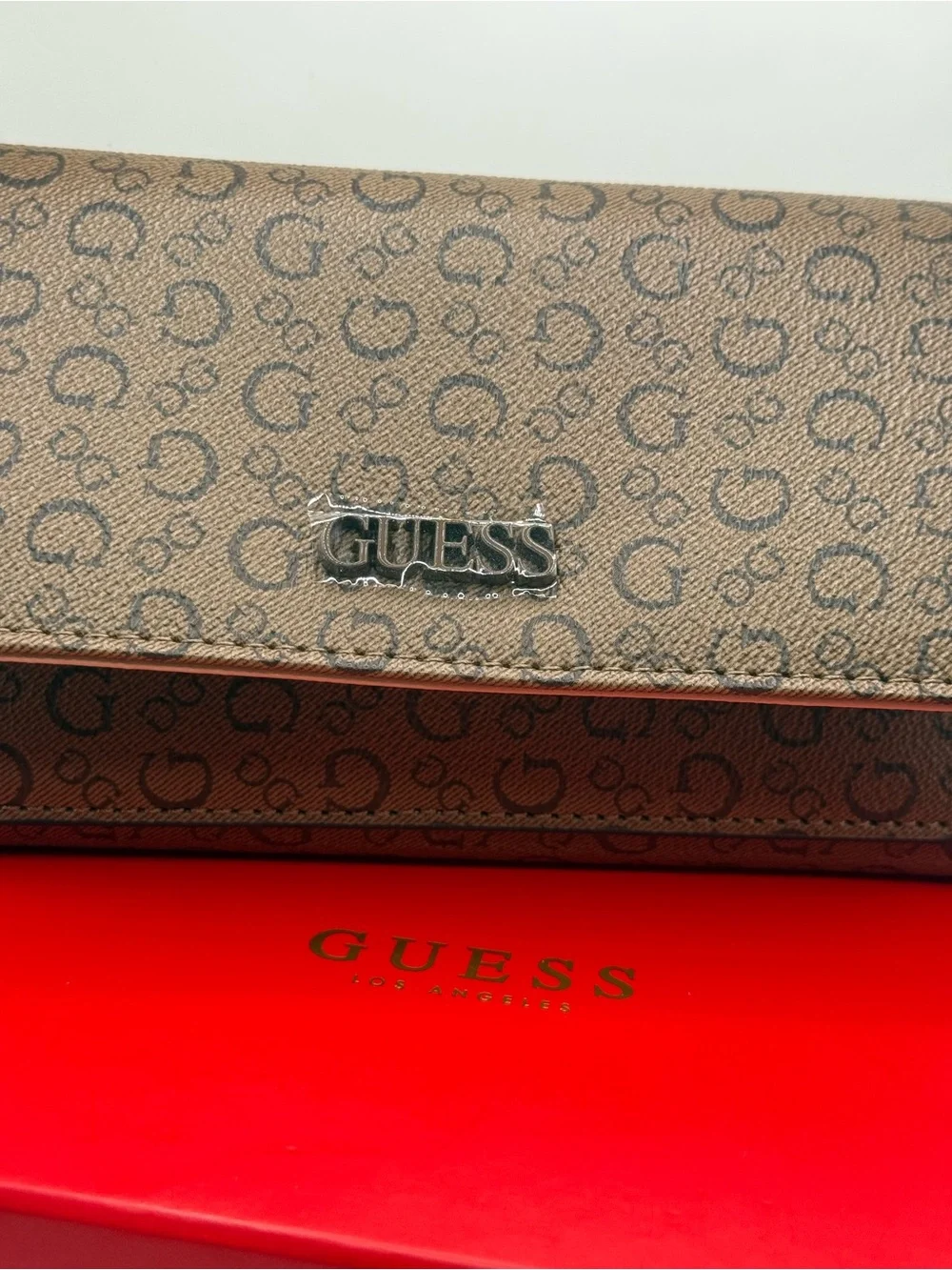 GUESS Brown Logo-Print Continental Wallet with Silver Plaque